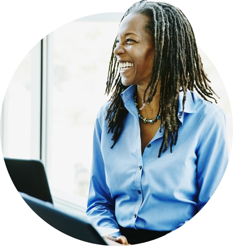 Smiling woman in conference room