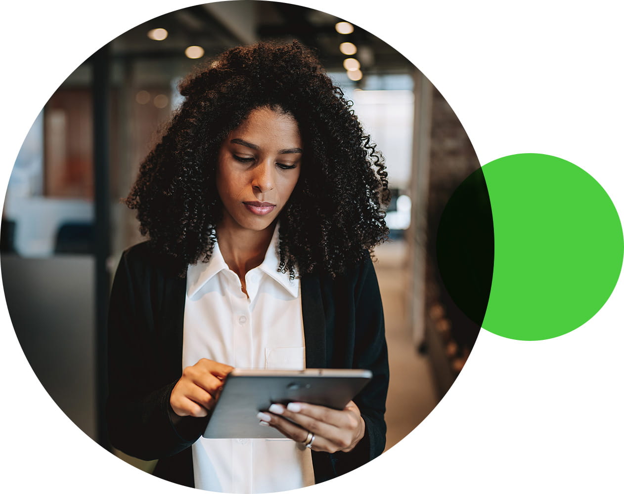 Two office colleagues sit across from one another having a discussion